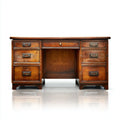 Bureau en bois brun avec sept tiroirs, structure rectangulaire